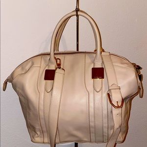 Leather cross body bag comes with dust bag